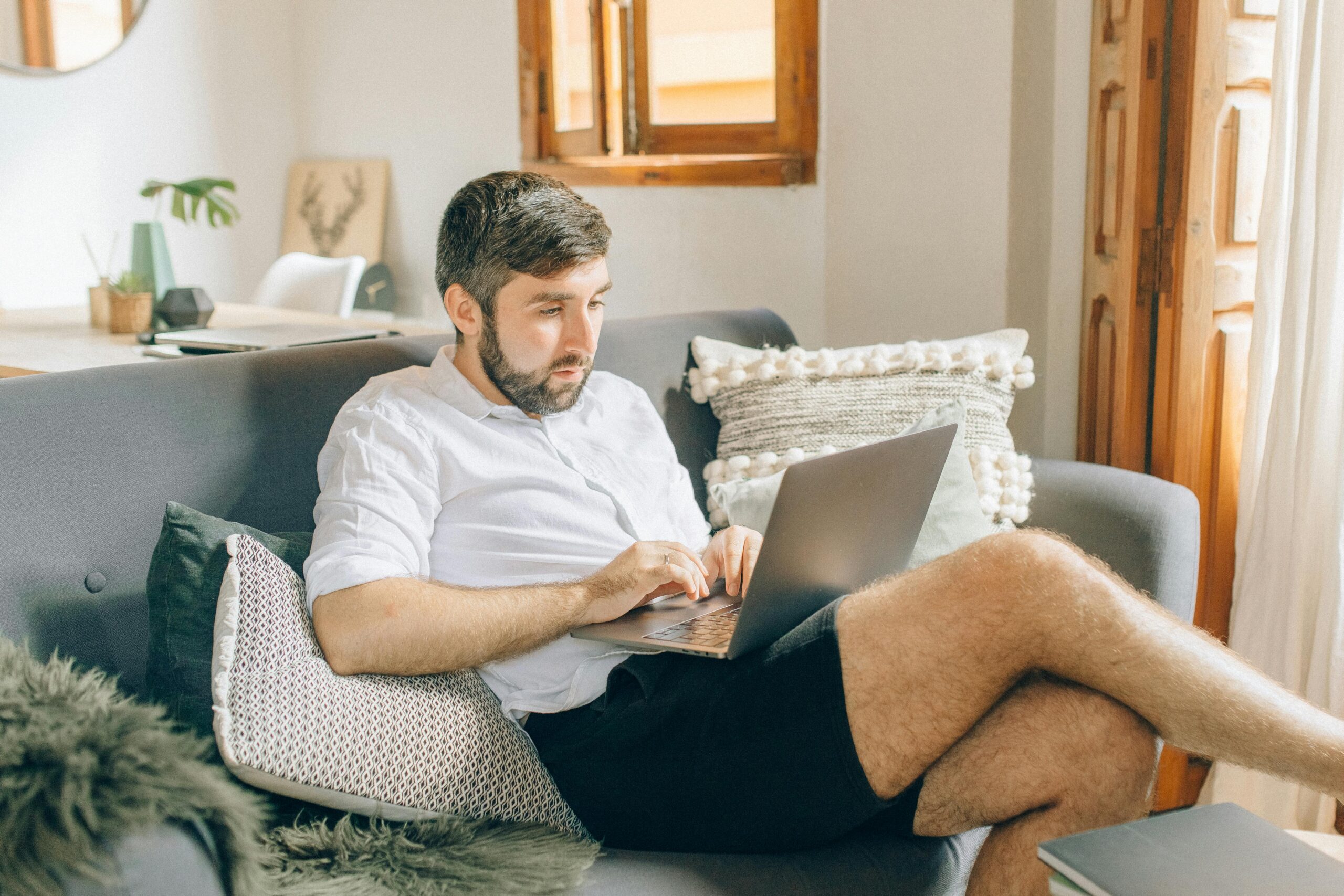 A man using a laptop.